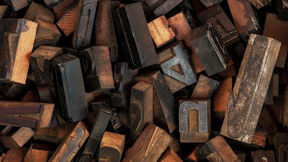 pile of blocks used for English language letterpress